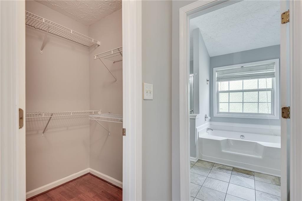 3337 Baymount Way Lawrenceville, GA 30043 - Photo 26 of 47 a bathroom with a tub and a sink