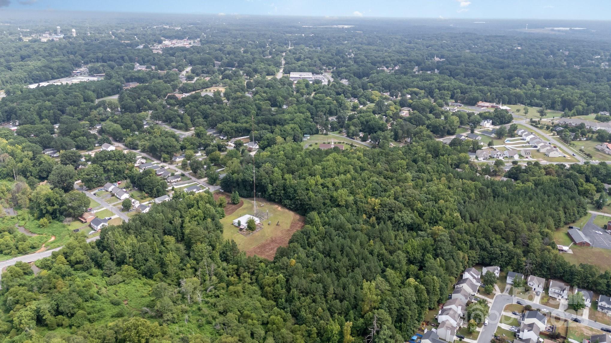 910 Fairview Street Kannapolis, NC 28083 - Photo 4 of 9 an aerial view of a house with yard
