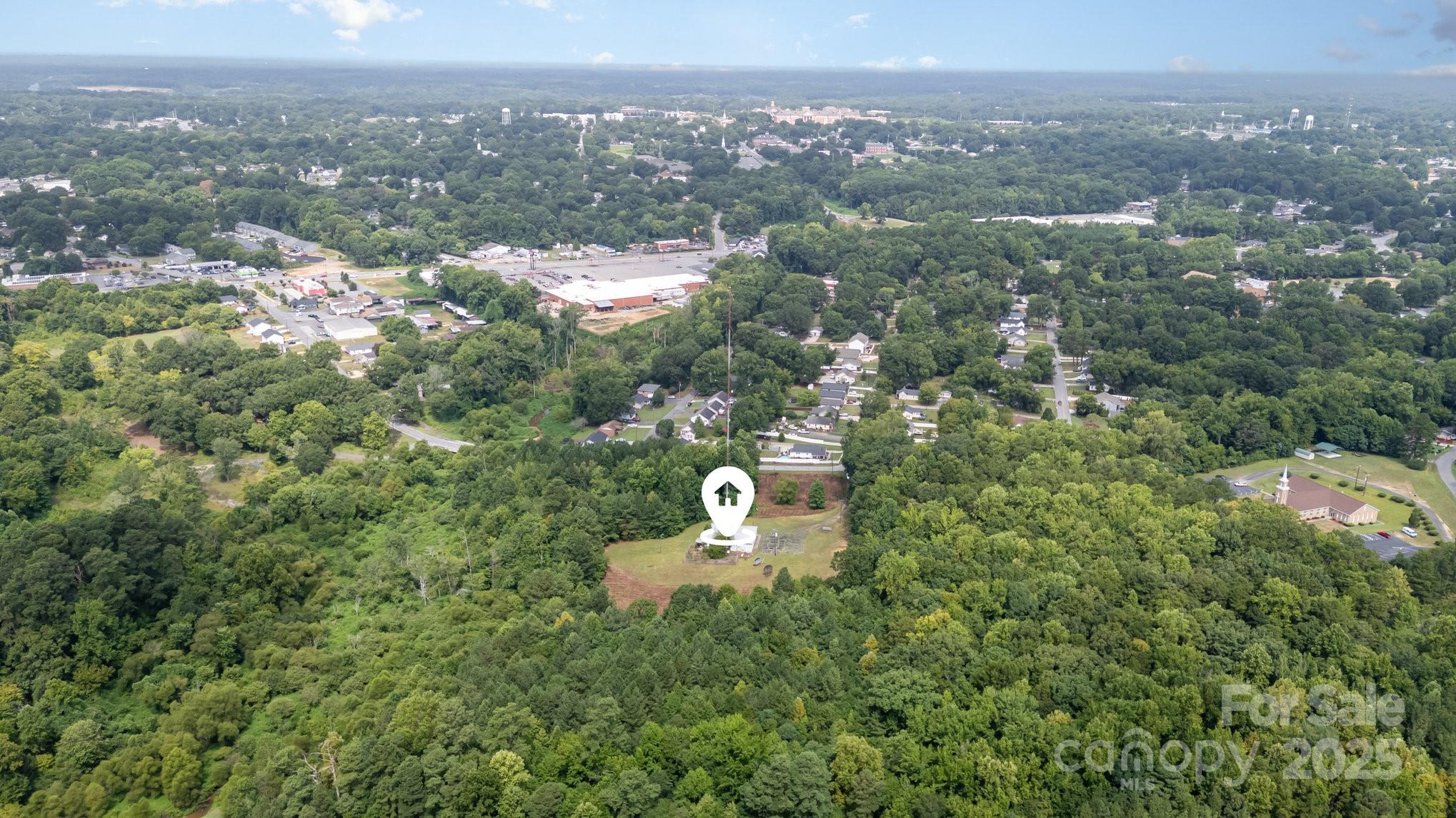 910 Fairview Street Kannapolis, NC 28083 - Photo 6 of 9 an aerial view of a house with a yard