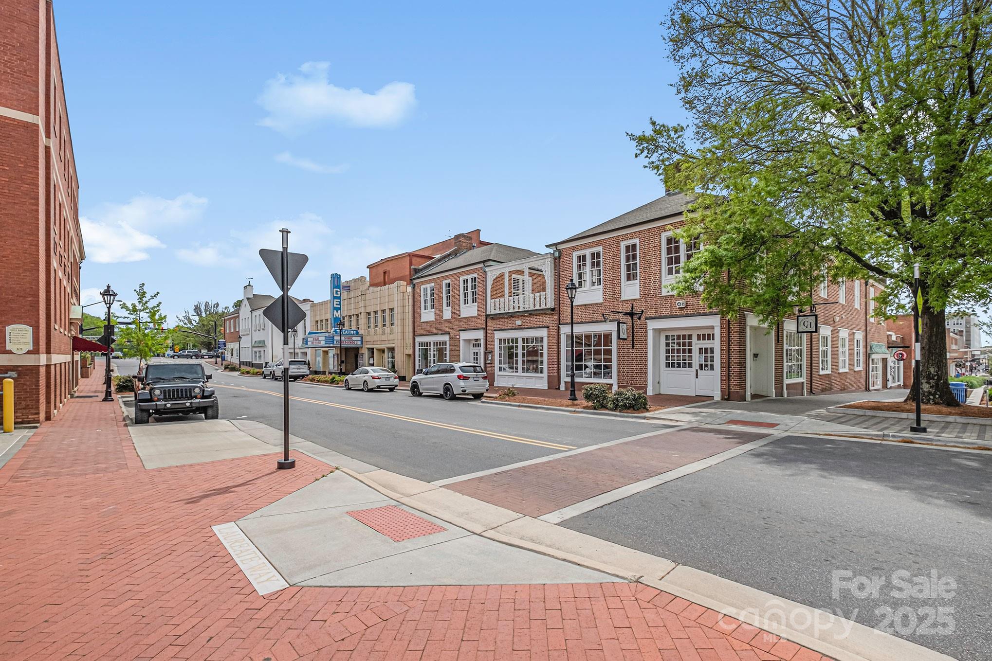 910 Fairview Street Kannapolis, NC 28083 - Photo 7 of 9 a city street lined with buildings and trees