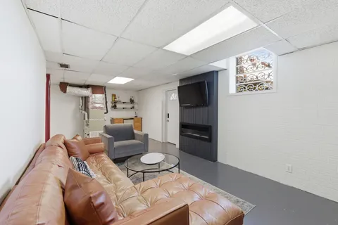 a living room with furniture and a table
