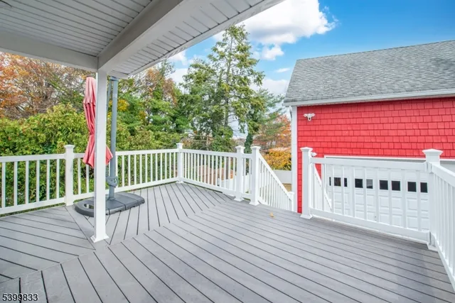 a bathroom with a sink toilet and mirror