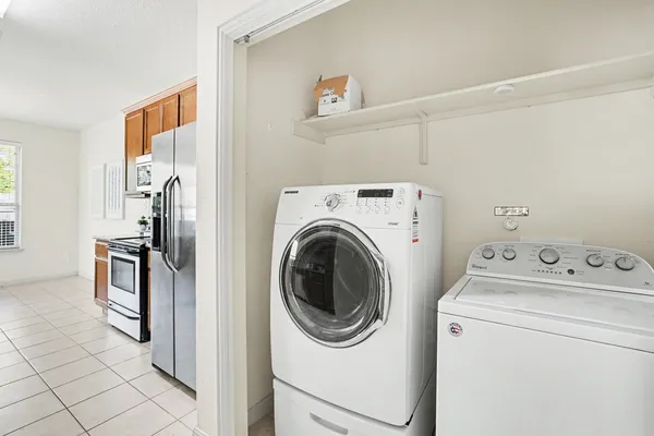 a utility room with dryer and washer