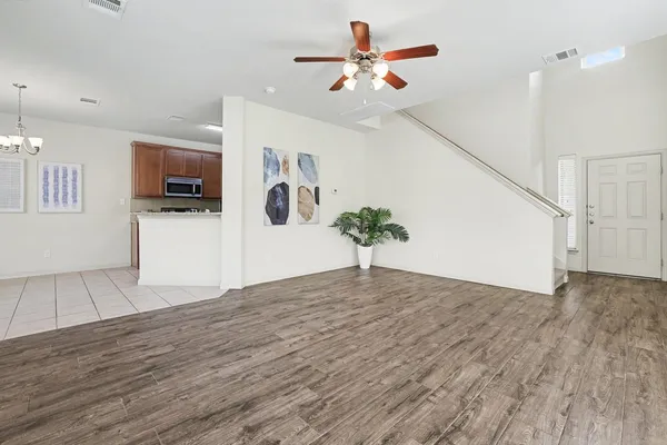 a view of a livingroom with wooden floor