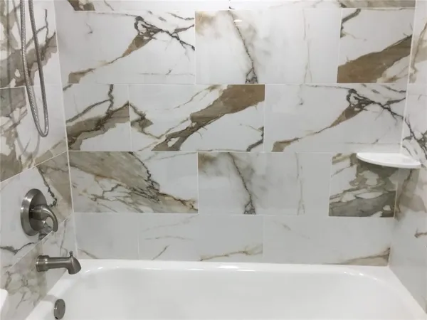 a bathroom with a bathtub