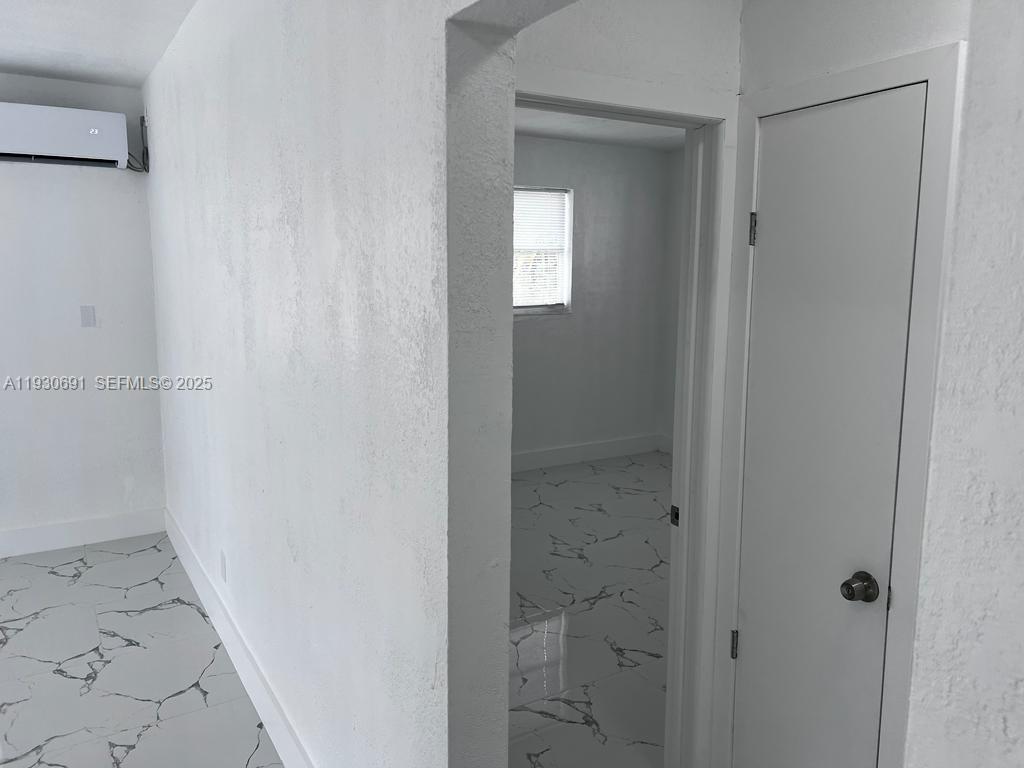 1131 Southwest 7th Street, Unit 3 Miami, FL 33130 - Photo 5 of 7 a bathroom with a shower