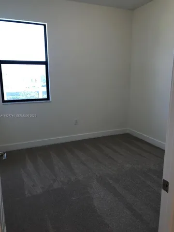 a view of a small space with window