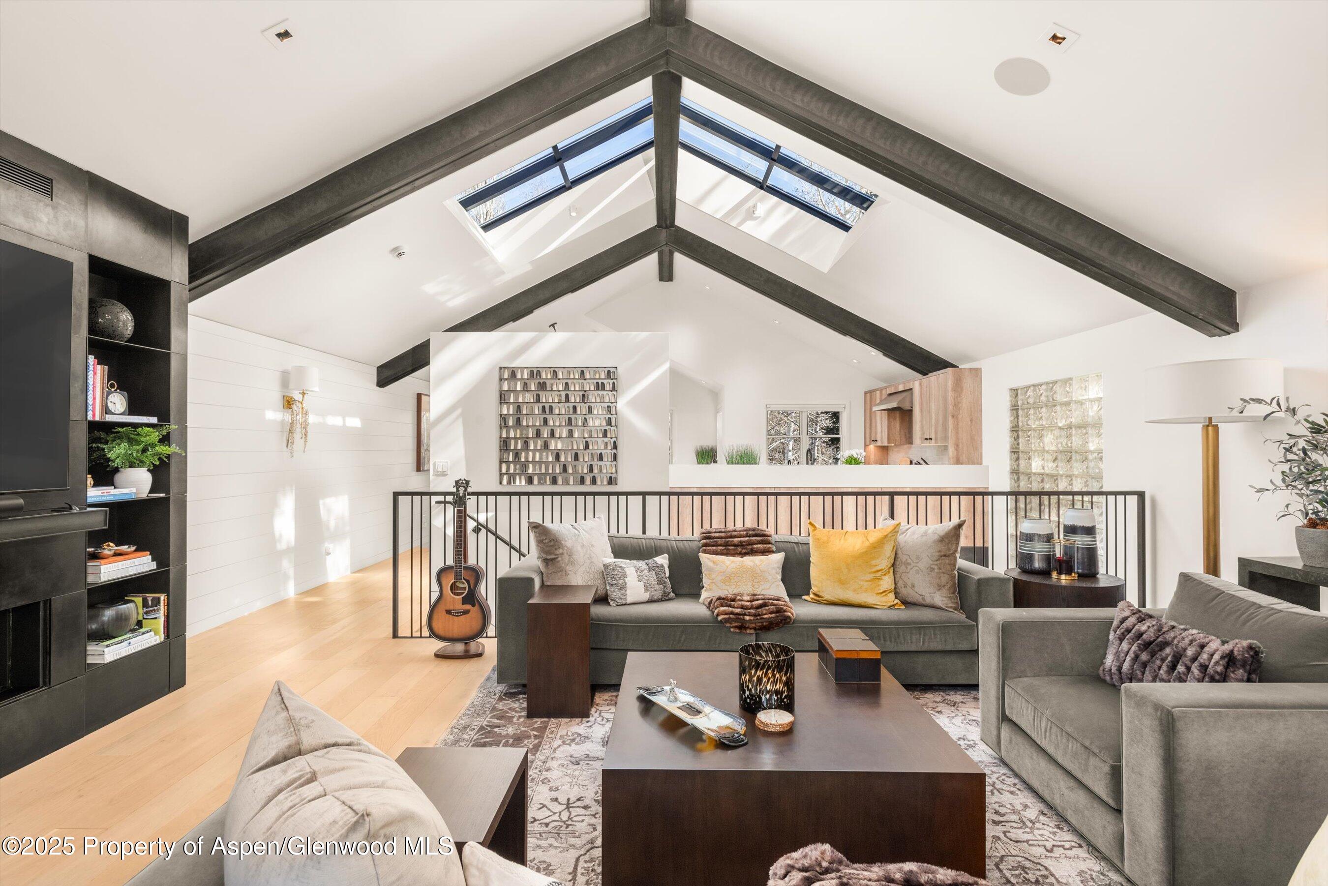 929 East Durant Avenue, Unit 4 Aspen, CO 81611 - Photo 13 of 43 a living room with furniture