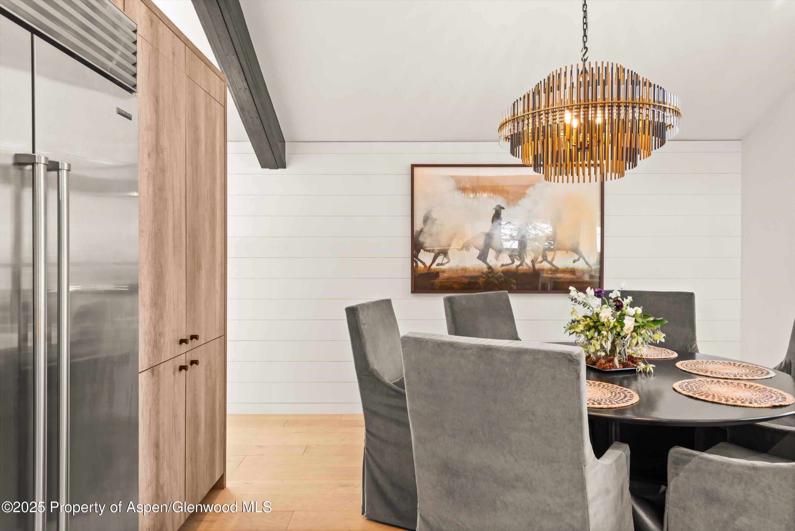 929 East Durant Avenue, Unit 4 Aspen, CO 81611 - Photo 19 of 43 a dining room with furniture and window