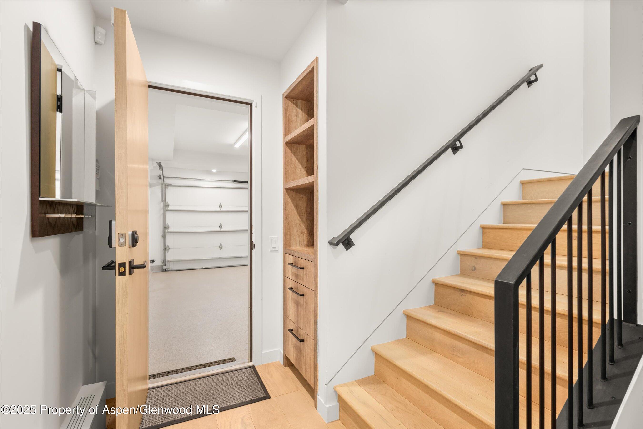 929 East Durant Avenue, Unit 4 Aspen, CO 81611 - Photo 41 of 43 a view of entryway with wooden floor and door