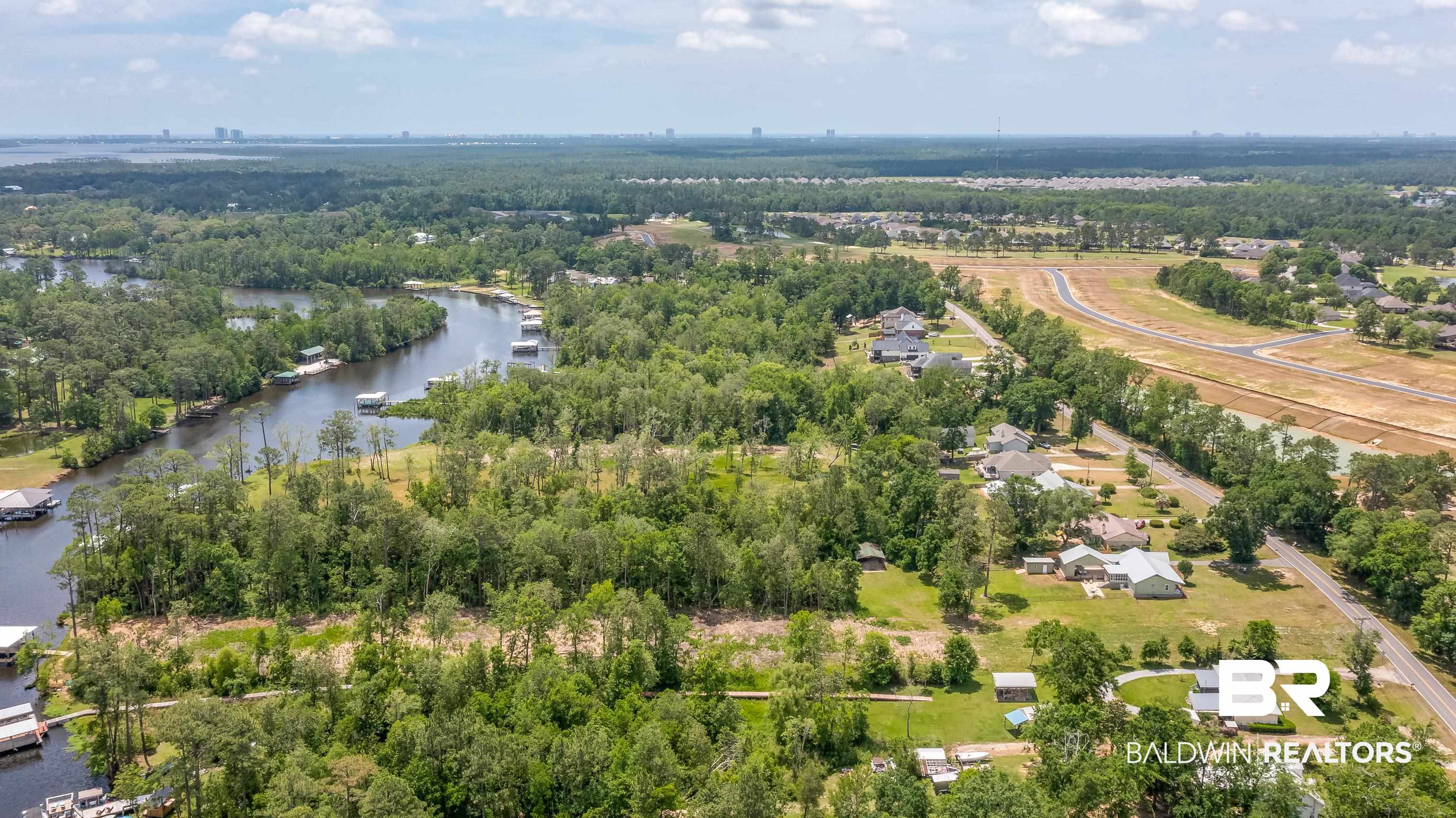 9771 Clarke Ridge Road Foley, AL 36535 - Photo 67 of 72 Aerial view featuring a water view