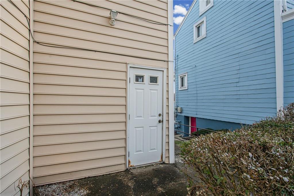 17 Locust Street Etna, PA 15223 - Photo 12 of 16 a view of a house with a small window