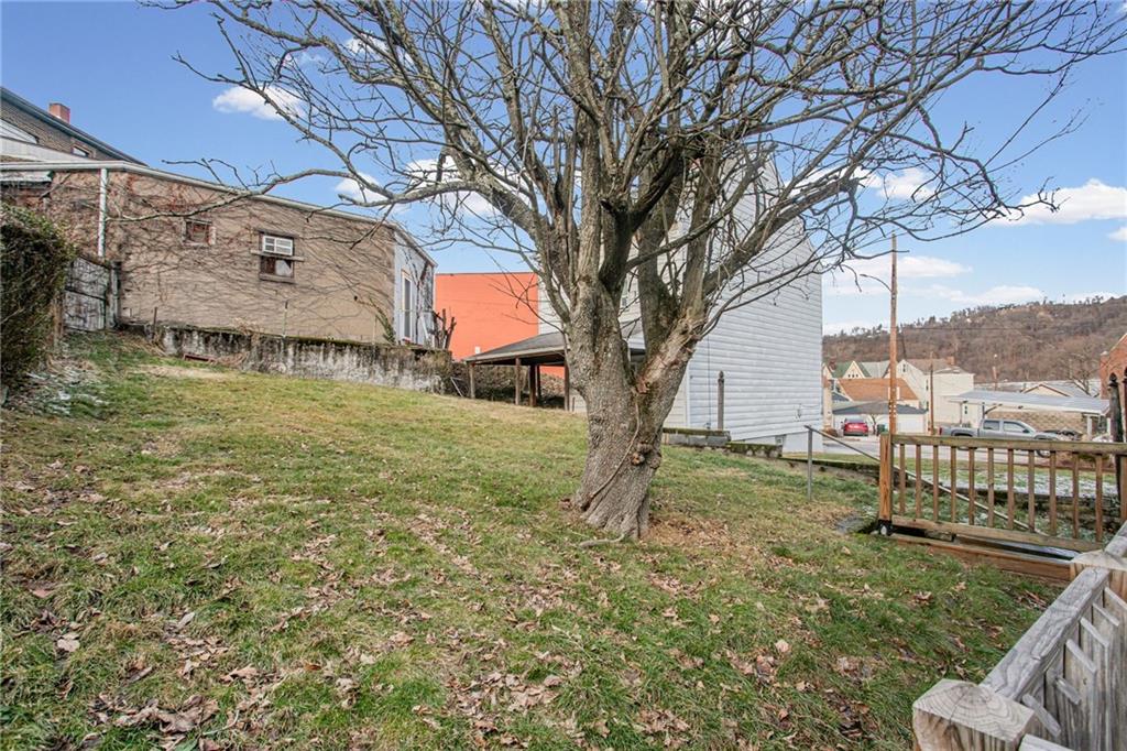 17 Locust Street Etna, PA 15223 - Photo 14 of 16 a view of a house with a yard
