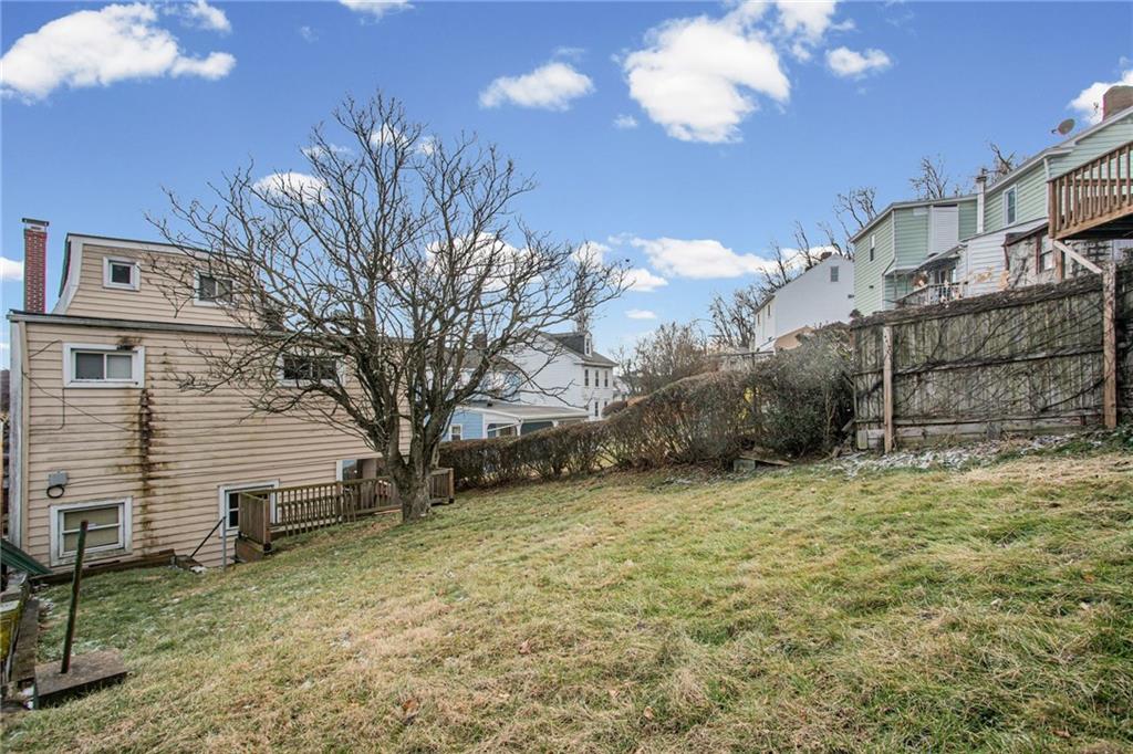 17 Locust Street Etna, PA 15223 - Photo 6 of 16 a view of a house with a snow