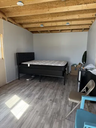 a view of workspace with wooden floor