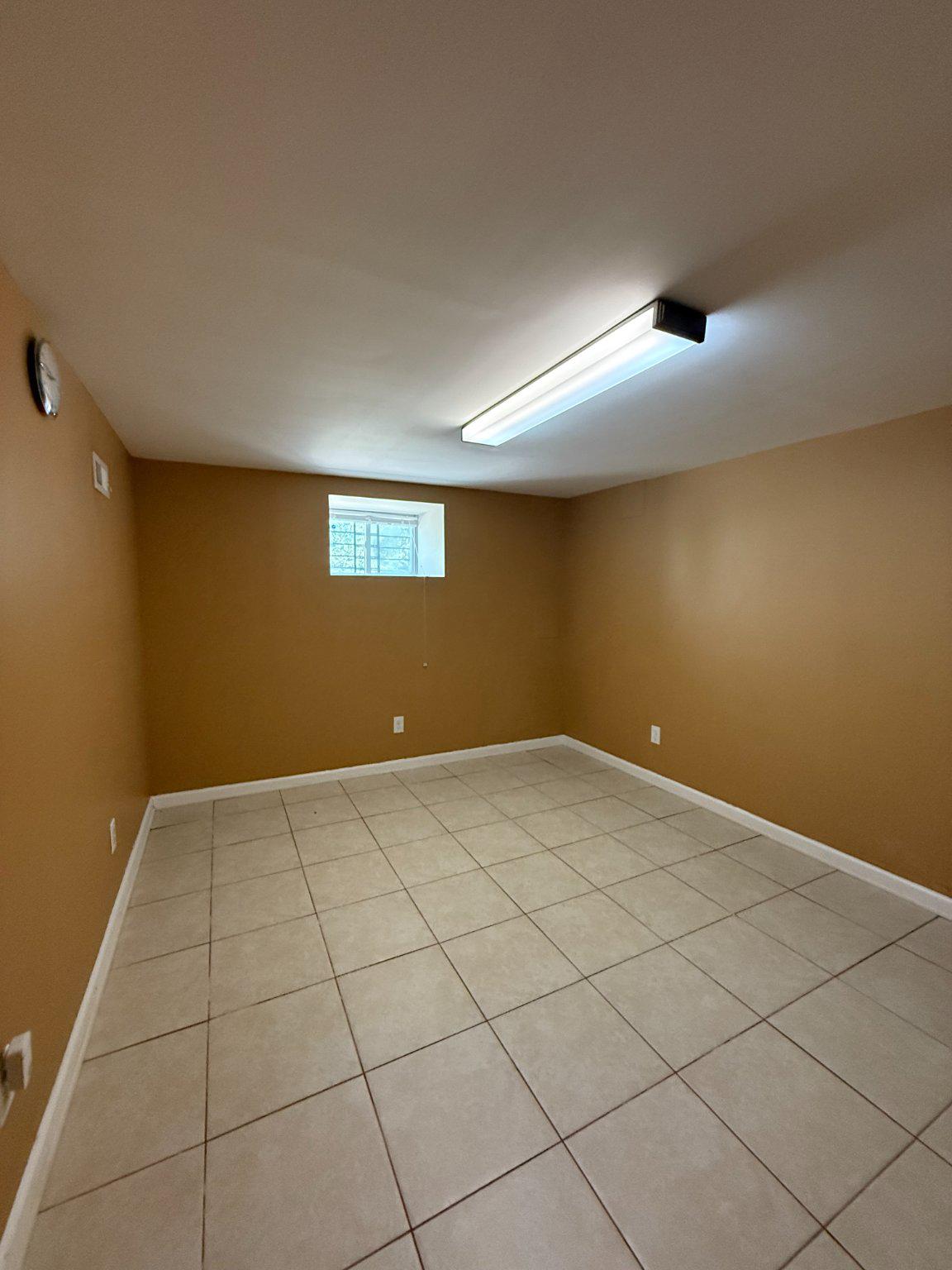 123 Winters Lane Baltimore, MD 21228 - Photo 20 of 28 Versatile room space in basement.