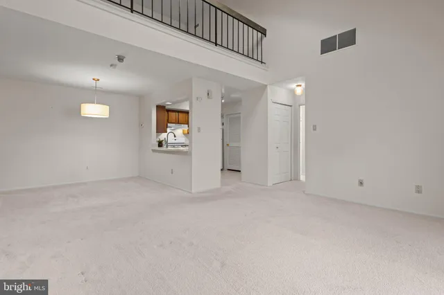 en empty room with windows