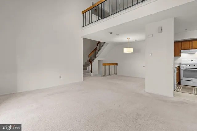 a view of a livingroom with furniture and fireplace
