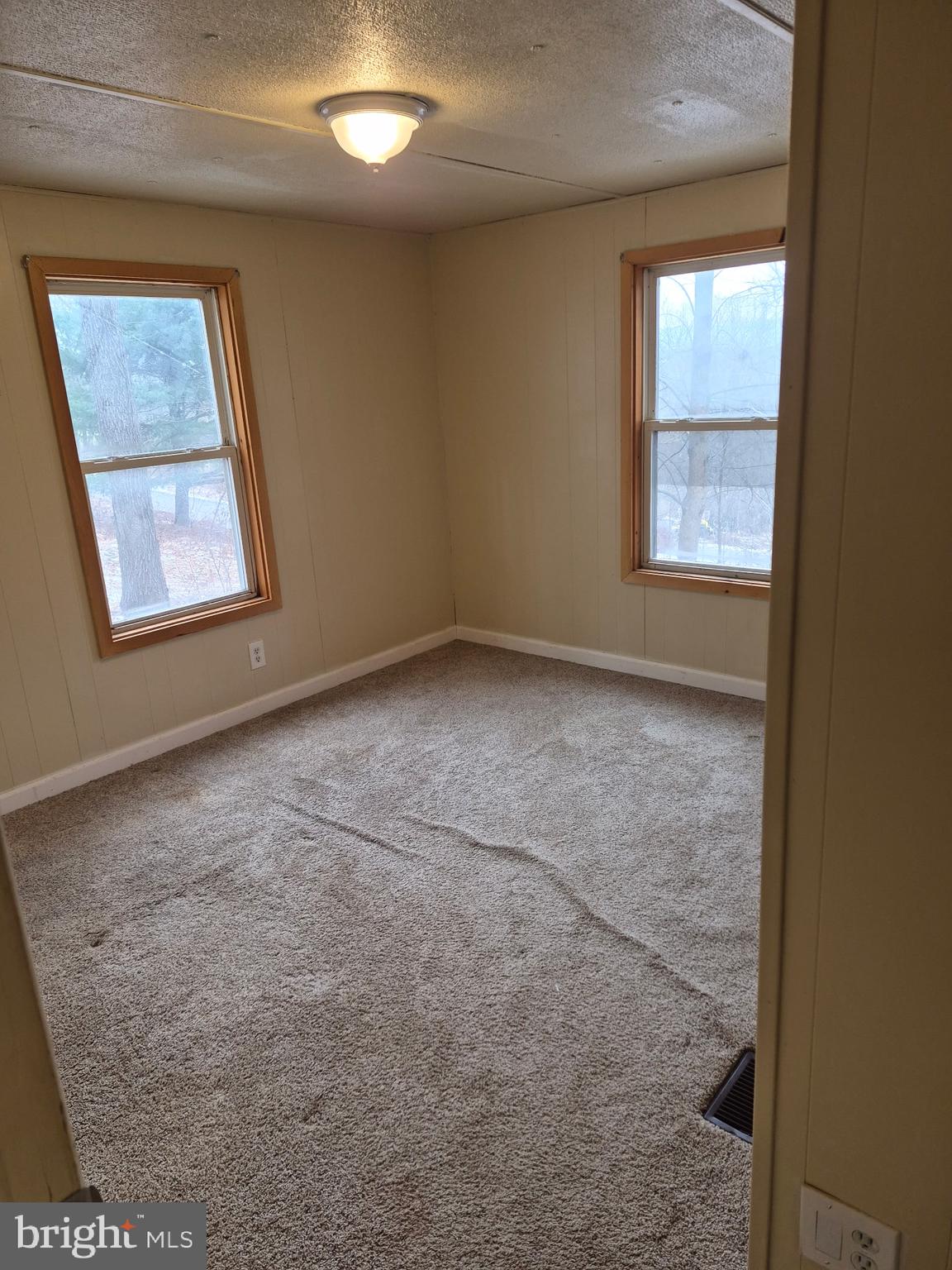 415 Daniel Road Newport, PA 17074 - Photo 14 of 19 an empty room with windows