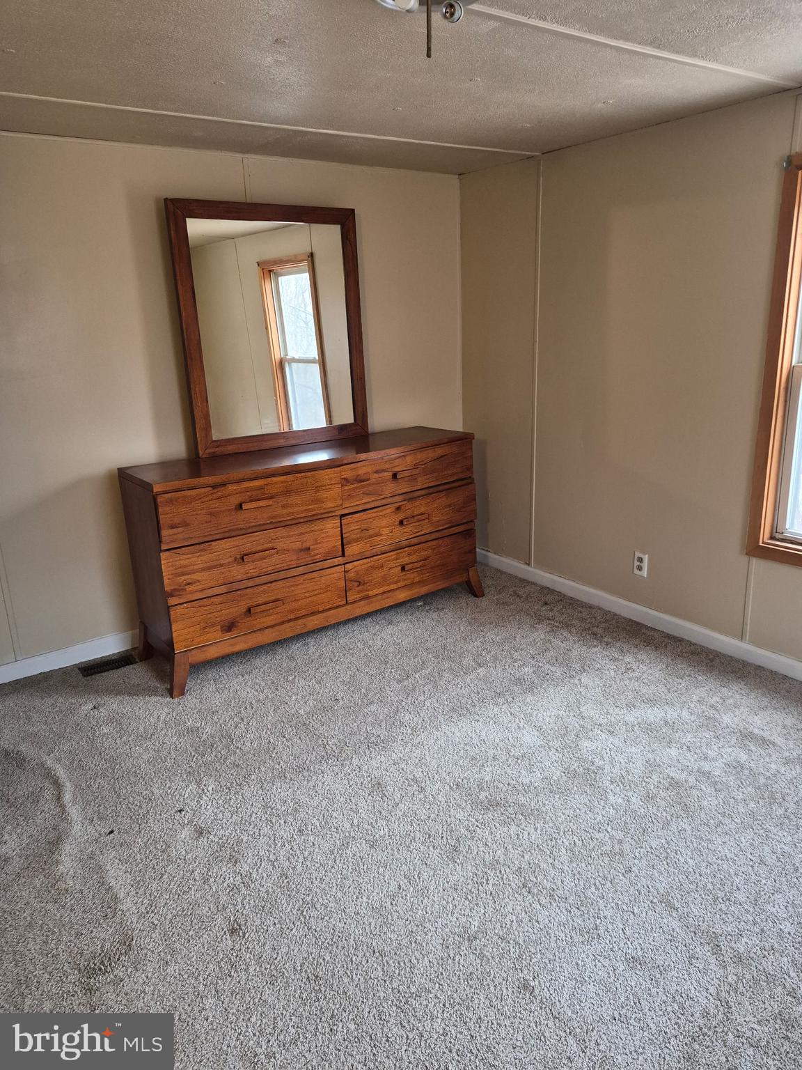 415 Daniel Road Newport, PA 17074 - Photo 16 of 19 a room with a dresser and a mirror