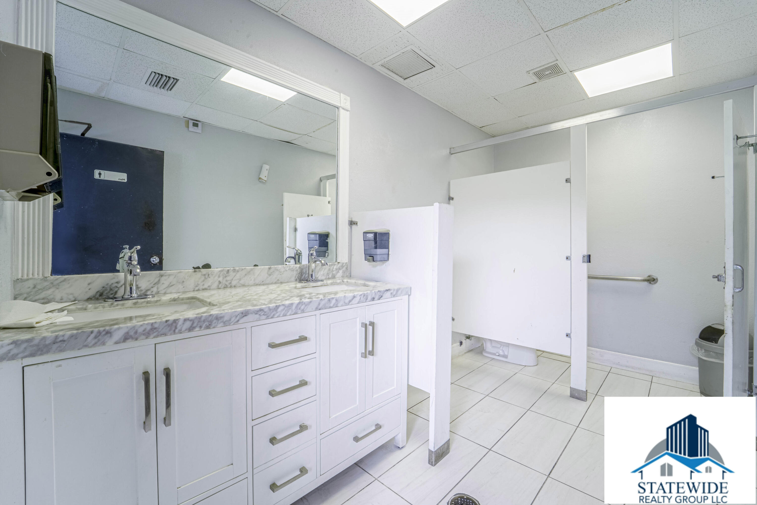 4524 Gun Club Road, Unit A203 West Palm Beach, FL 33415 - Photo 18 of 18 21_mens bathroom