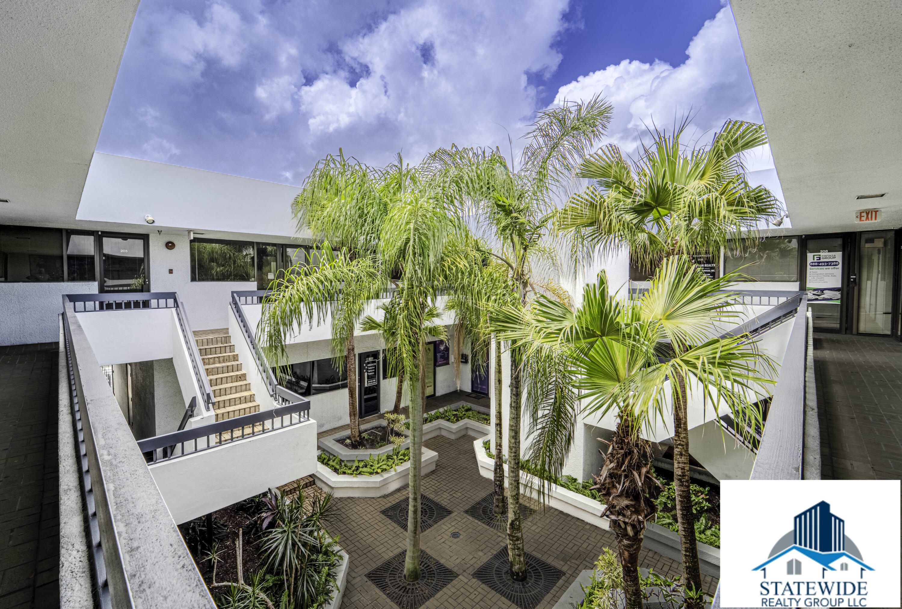 4524 Gun Club Road, Unit A203 West Palm Beach, FL 33415 - Photo 3 of 18 8_courtyard