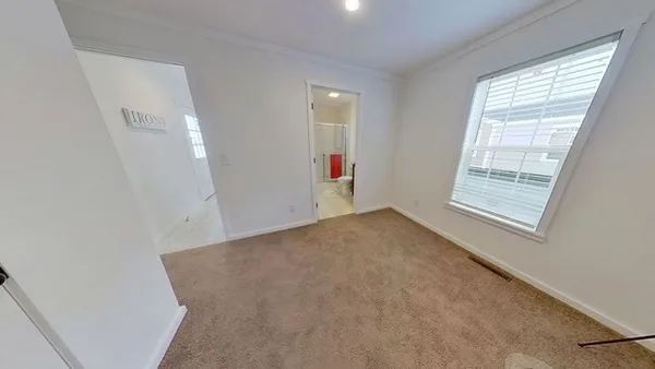 an empty room with windows