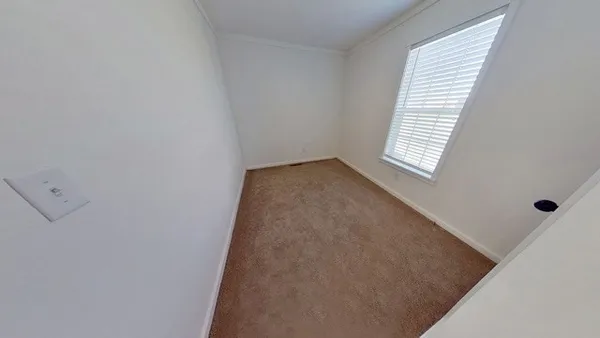 a view of a room with windows