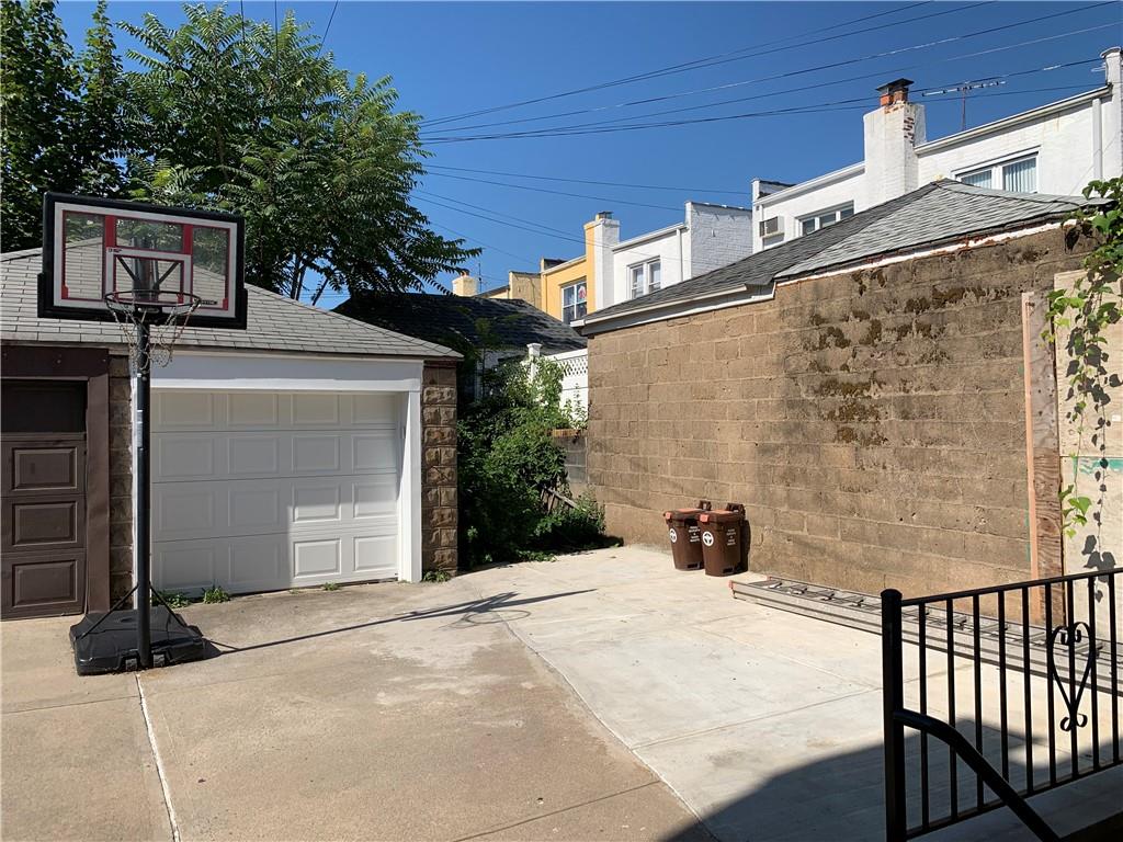 1014 Bay Ridge Parkway Brooklyn, NY 11228 - Photo 10 of 10 a view of a street with a building in the background