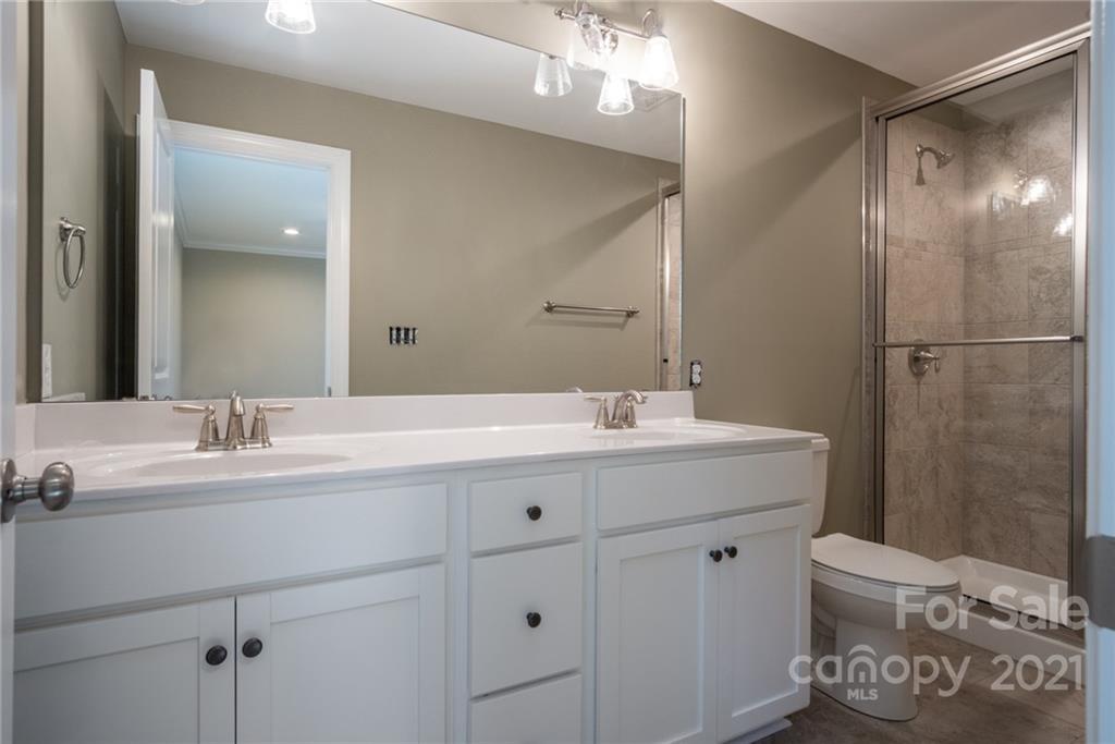 3733 Hamilton Road Edgemoor, SC 29712 - Photo 18 of 29 a bathroom with a sink double vanity and a mirror