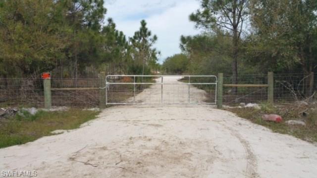 1771 Red Deer Road Naples, FL 34120 - Photo 1 of 9 GATED ENTRY