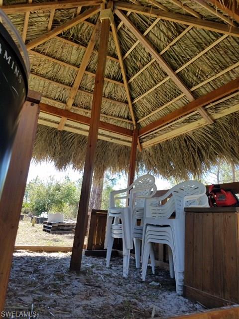 1771 Red Deer Road Naples, FL 34120 - Photo 4 of 9 INSIDE VIEW TIKI HUT