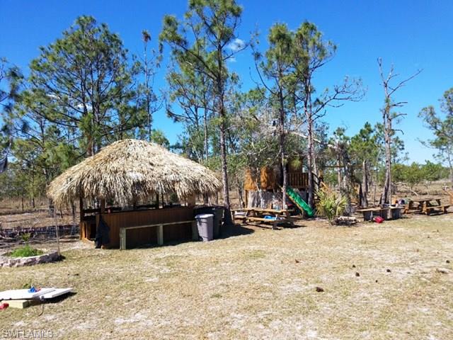 1771 Red Deer Road Naples, FL 34120 - Photo 5 of 9 CLEARED LOT W/HUT, PICNIK TABLE & PLAYGROUND