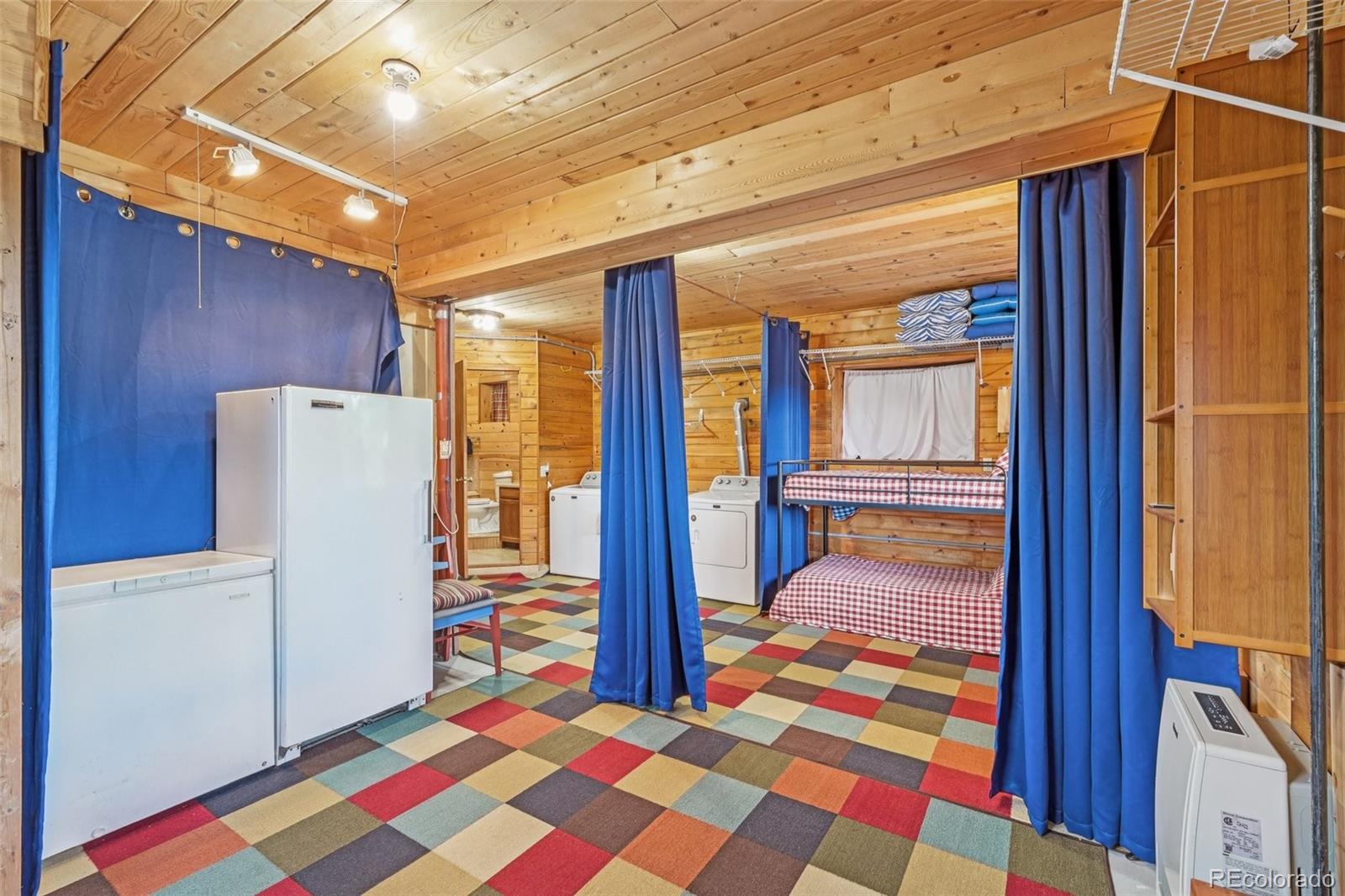 215 Gadwall Road Como, CO 80432 - Photo 19 of 39 a very nice looking room with a large window