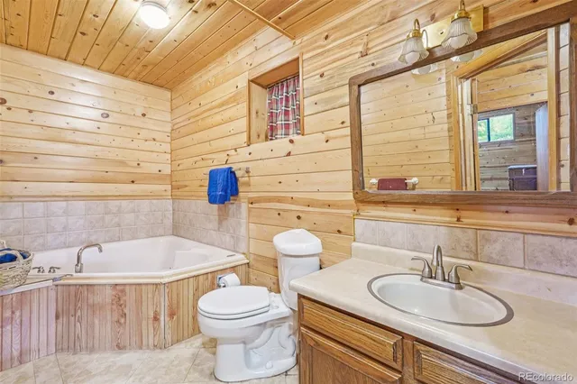 a bedroom with a bed and a walk in closet