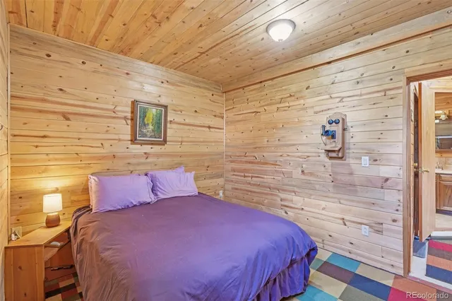 a balcony with trees in the back