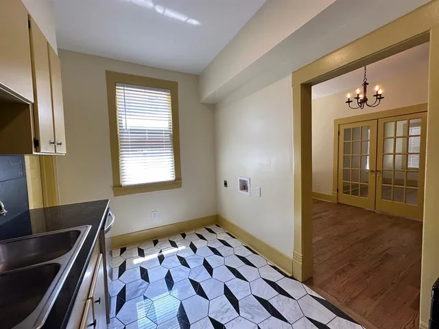 a bedroom with window