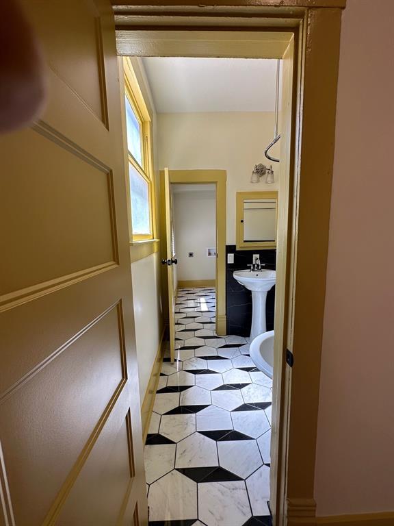 4910 Victor Street, Unit 1 Dallas, TX 75214 - Photo 21 of 30 a living room with furniture and a fireplace