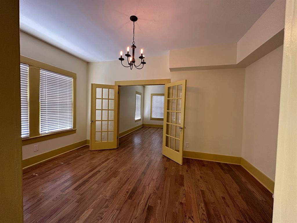 4910 Victor Street, Unit 1 Dallas, TX 75214 - Photo 6 of 30 a view of livingroom with hardwood floor and window