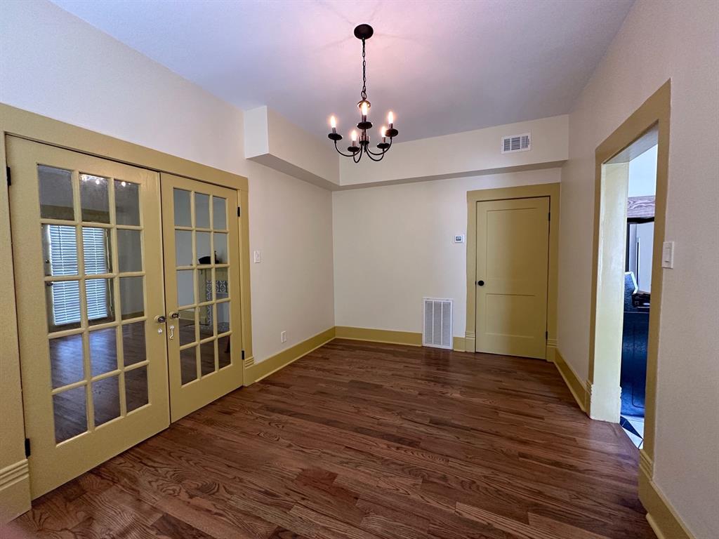 4910 Victor Street, Unit 1 Dallas, TX 75214 - Photo 8 of 30 a view of an empty room with a window