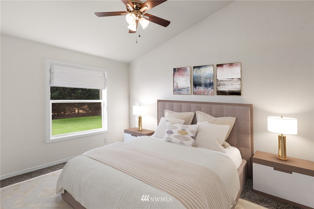 18512 Elderberry Street Southwest Rochester, WA 98579 - Photo 13 of 18 a bedroom with a bed and a window