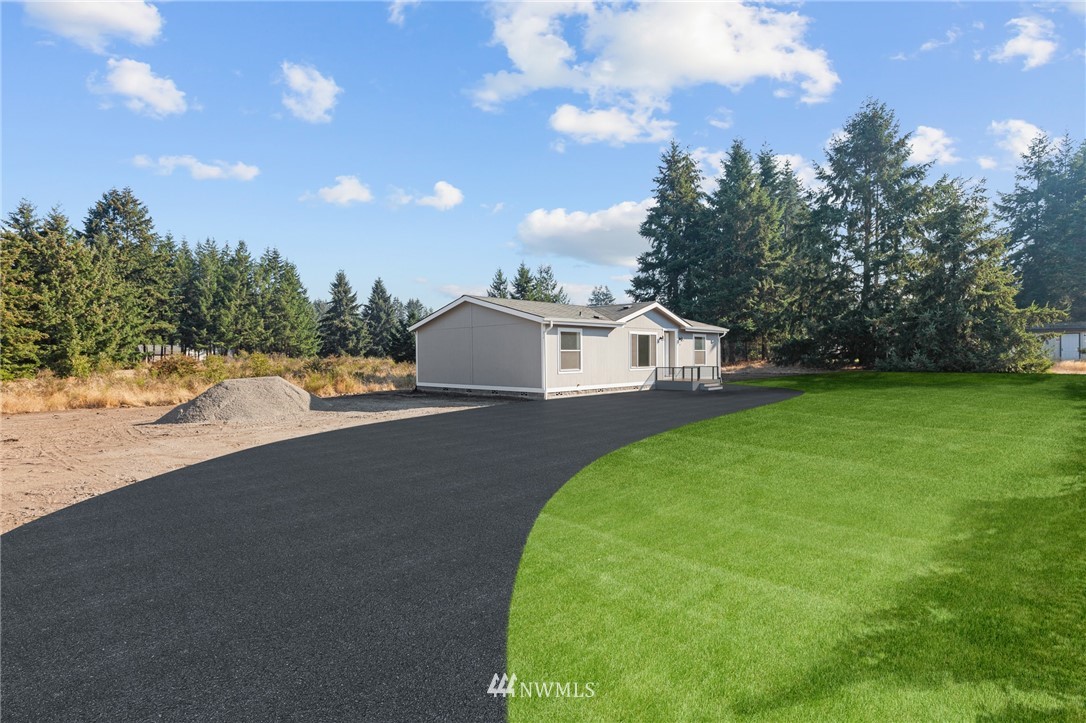 18512 Elderberry Street Southwest Rochester, WA 98579 - Photo 18 of 18 a view of a backyard of the house