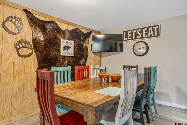 a view of a table and chairs in a room