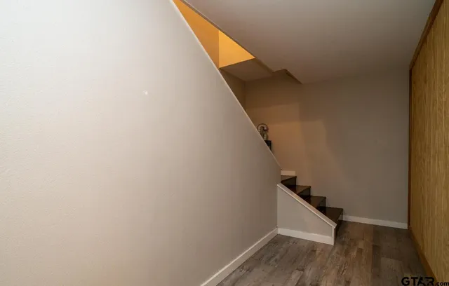 a view of entryway with wooden floor