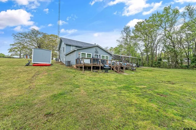 a view of a house with a big yard