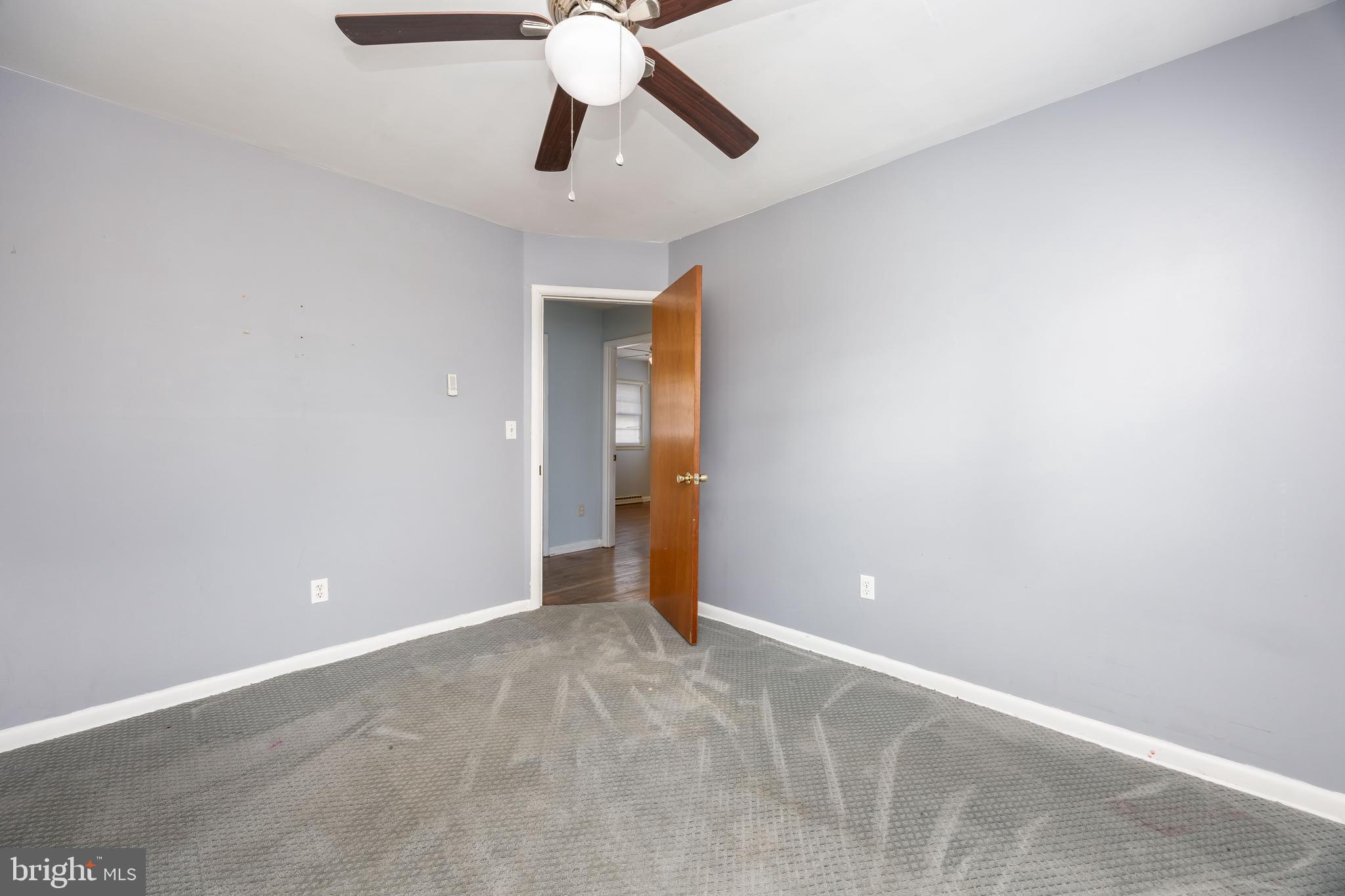 310 Zion Road Salisbury, MD 21804 - Photo 24 of 40 an empty room and chandelier fan