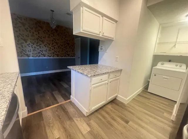 a view of kitchen and utility room