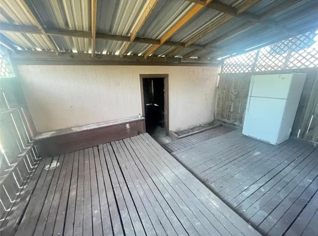 a view of a livingroom with wooden floor