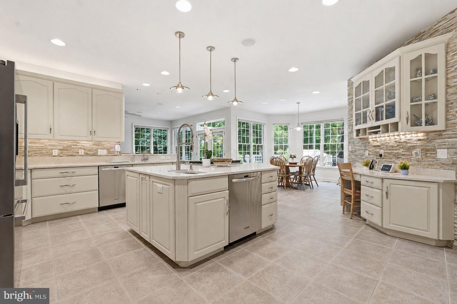11640 Piney Spring Lane Potomac, MD 20854 - Photo 8 of 38 Chef's Gourmet Kitchen with Expansive Center Islan