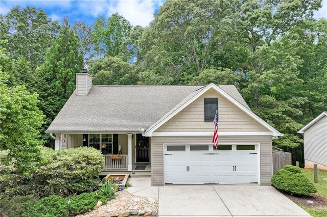 a view of a house with a garage